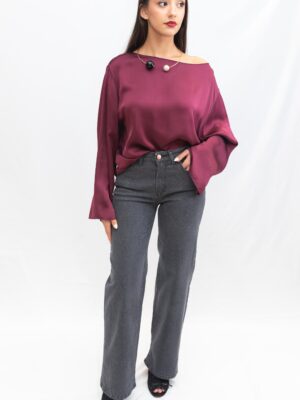 Pantalón gris con destellos brillantes de talle medio D’l visto de frente.